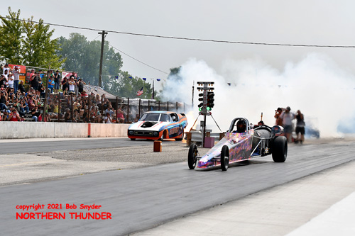Tammy Gatlin - 'Lone Star Lightning' 
- Jet Dragster (near lane) vs Paul Sieli - 'Mustang Sally' - Jet Funny Car (far lane)